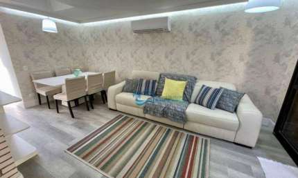 Village com 3 dormitórios à venda, 92 m² por R$ 1.490.000,00 - Riviera de São Lourenço - Bertioga/SP