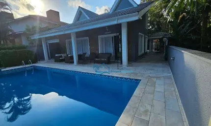 Casa com 4 dormitórios à venda, 320 m² por R$ 4.900.000,00 - Riviera Módulo 20 - Bertioga/SP
