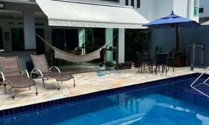 Casa com 4 dormitórios à venda, 300 m² por R$ 3.700.000,00 - Riviera Módulo 26 - Bertioga/SP