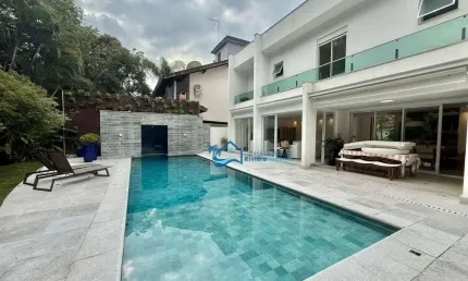 Casa com 4 dormitórios, 322 m² - venda por R$ 4.800.000,00 ou aluguel por R$ 24.000,00/mês - Riviera Módulo 30 - Bertioga/SP