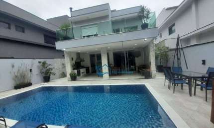 Casa com 4 dormitórios, 260 m² - venda por R$ 6.500.000,00 ou aluguel por R$ 16.000,00/mês - Riviera - Módulo 24 - Bertioga/SP