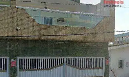 Sobrado com 3 dormitórios à venda, 240 m² por R$ 850.000,00 - Boqueirão - Praia Grande/SP