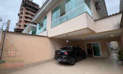 Sobrado alto padrão com piscina 4 suítes à venda, 330 m² por R$ 1.620.000 - Canto do Forte - Praia Grande/SP