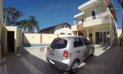 Sobrado com piscina  4 dormitórios à venda, 165 m² por R$ 1.500.000  Solemar  Praia Grande SP