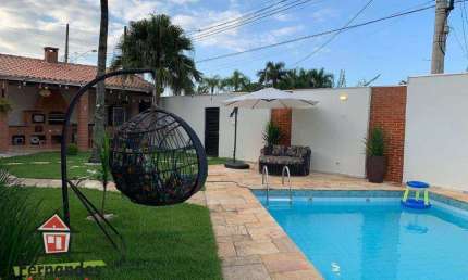 Casa isolada com piscina e espaço gourmet  3 dormitórios mais dependência à venda, 220 m² por R$ 1.300.000  Balneário Flórida  Praia Grande SP