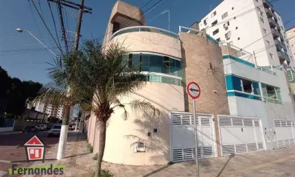 Sobrado com 3 dormitórios à venda, 264 m² por R$ 775.000,00 - Tupi - Praia Grande/SP