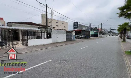 Casa comercial  com 210 metros de terreno  à venda, 180 m² de área construída  por R$ 1.200.000  em avenida comercial  Guilhermina Praia Grande/SP