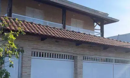 Casa de condomínio com 2 dormitórios à venda, 54 m² por R$ 270.000 - Maracanã - Praia Grande/SP