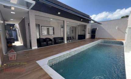 Casa com piscina automação remota e área gormet à venda por  R$1.400.000 Ocian Praia Grande/SP.