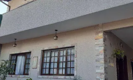 Sobrado isolado alto padrão com 5 dormitórios à venda, 397 m² por R$ 1.550.000 - Centro - Peruíbe/SP