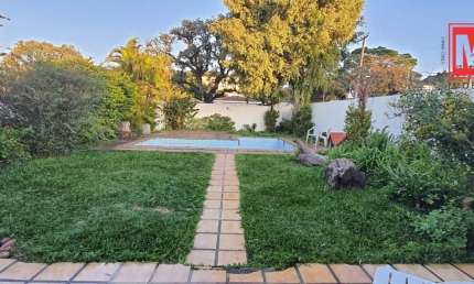 CASA COM TERRENO !! ou quer troca por apto na praia de Sc.