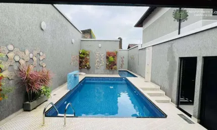 Casa com 2 dormitórios à venda, 55 m² por R$ 330.000 - Maracanã - Praia Grande/SP