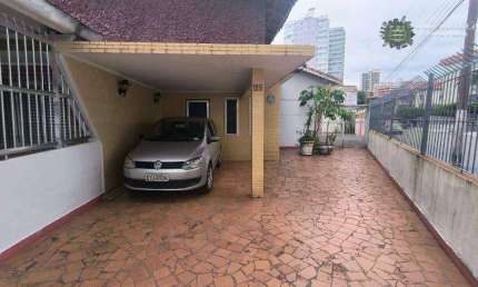 Casa com 3 dormitórios à venda, 240 m² por R$ 700.000,00 - Caiçara - Praia Grande/SP