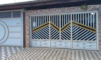 Casa com 2 dormitórios à venda, 64 m² por R$ 390.000,00 - Caiçara - Praia Grande/SP