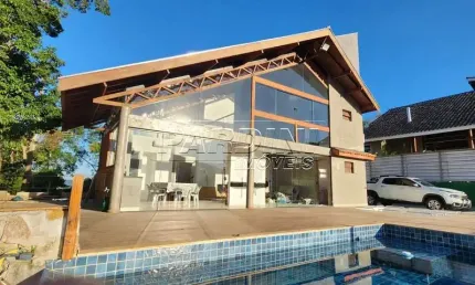 Excelente casa recém construída, com 5 suítes, piscina, área gourmet e linda vista para o mar, na praia das Toninhas em Ubatuba!