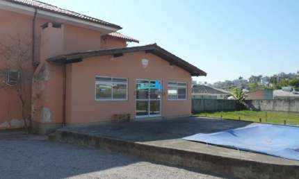 Casa em condomínio fechado com 3 quartos à venda em Pedra Branca, Palhoça  por R$ 600.000