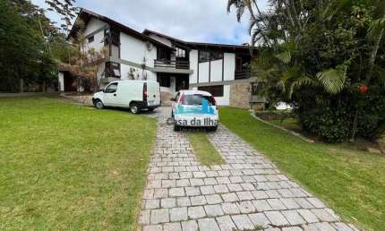 Casa em condomínio fechado com 4 quartos à venda no Cacupé, Florianópolis  por R$ 2.900.000