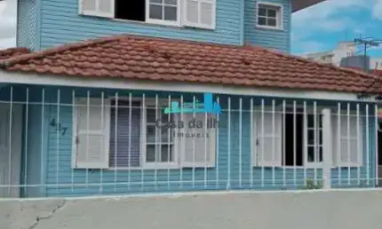 Casa com 4 quartos à venda na Praia Comprida, São José  por R$ 900.000