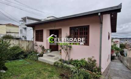 TERRENO COM CASAS PARA INVESTIMENTO NO BAIRRO ALTO.