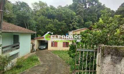 TERRENO NO SANTA CÂNDIDA! COM 03 CASAS,PROX. SUPERMERCADO BONI