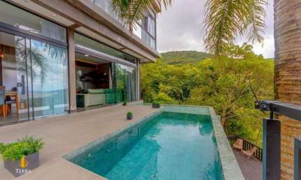 Casa de luxo a venda localizado no bairro Taquaras em Balneário Camboriú.