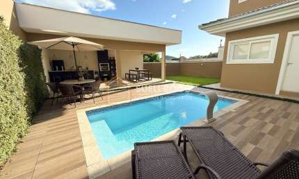 CASA EM CONDOMÍNIO COM 4 DORMITÓRIOS, PISCINA E ÁREA DE FESTAS