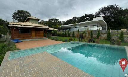 Casa com 3 dormitórios à venda, 200 m² por R$ 1.200.000,00 - Condomínio Serra dos Bandeirantes - Mário Campos/MG