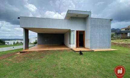 Casa com 3 dormitórios à venda, 200 m² por R$ 900.000,00 - Condomínio Serra dos Bandeirantes - Mário Campos/MG