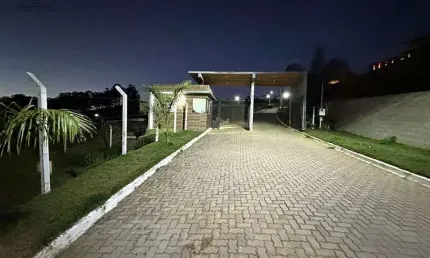 Lote a venda de 1500m2 em condomínio fechado Colina do Sol por 220 mil