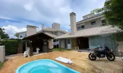 Casa em condomínio fechado com 4 quartos à venda na Avenida Interbalneários, 436, Atlântida, Xangri-Lá por R$ 3.000.000