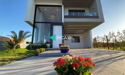Casa em condomínio fechado com 5 quartos à venda na Rio das Camisas, 101, Remanso, Xangri-Lá por R$ 2.490.000