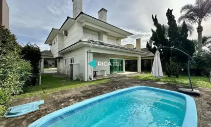 Casa em condomínio fechado com 5 quartos à venda na Avenida Interbalneários, 436, Atlântida, Xangri-Lá por R$ 2.650.000