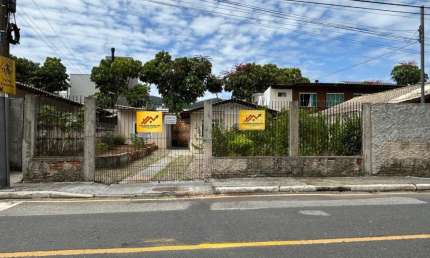 TERRENO ESCRITURADO COM 02 CASAS NO BAIRRO DA BARRA EM BALNEÁRIO CAMBORIÚ