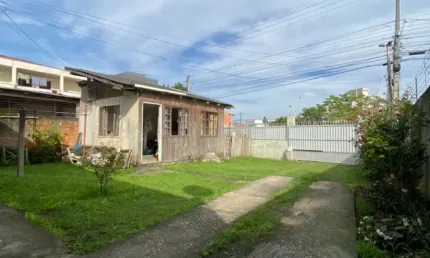 Casa em camboriú com espaço amplo na frente com 3 quartos bairro santa regina!!