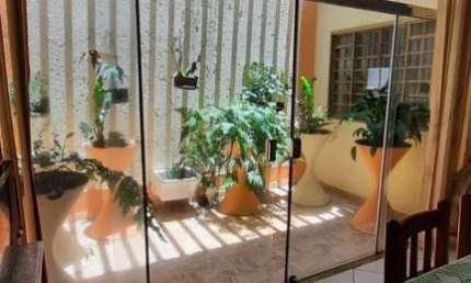Casa para Venda em Uberlândia, Jardim Karaiba, 4 dormitórios, 2 suítes, 5 banheiros, 3 vagas
