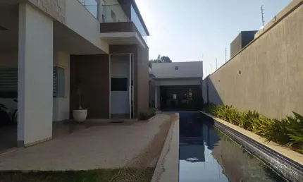 Casa para Venda em Uberlândia, Jardim Karaiba, 4 dormitórios, 4 suítes, 5 banheiros, 4 vagas