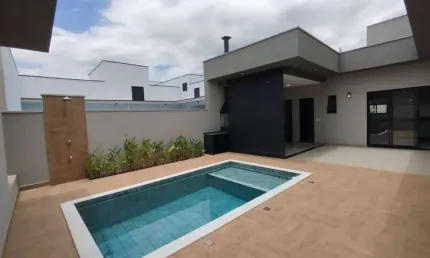 Luxuosa casa à venda em Indaiatuba-SP, condomínio Laguna 3 quartos, 3 suítes, 2 salas, 5 banheiros, 2 vagas, 184m².