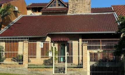 Casa com 4 quartos à venda na Rua Alcebíades Antônio dos Santos, 107, Nonoai, Porto Alegre