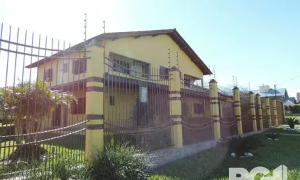 Casa 4 dormitórios à venda Parque Santa Fé Porto Alegre/RS
