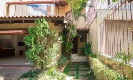 Casa 4 dormitórios à venda Rio Branco Porto Alegre/RS