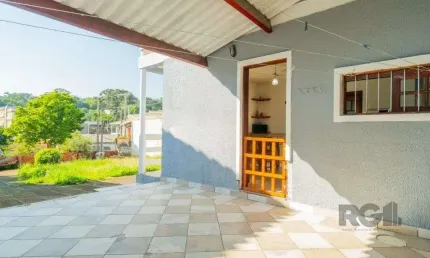 Casa com 3 quartos à venda na Rua Mathilde Zatar, 87, Nonoai, Porto Alegre
