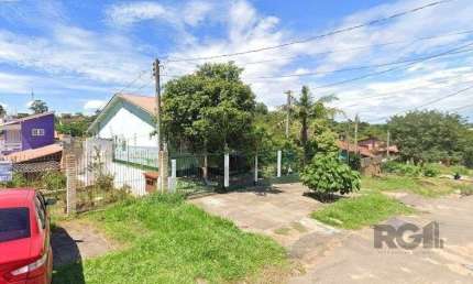 Casa com 3 quartos à venda na Rua Ênio de Souza, 226, Vila Nova, Porto Alegre