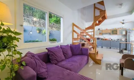 Living em dois ambientes com cozinha americana, lavabo, pátio, lavanderia. o3 do