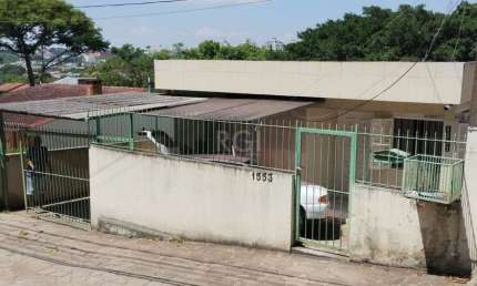 Casa com 4 quartos à venda na Avenida Vicente Monteggia, 1553, Cavalhada, Porto Alegre