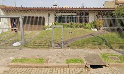 Casa com 4 quartos à venda na Rua Jacipuia, 201, Guarujá, Porto Alegre
