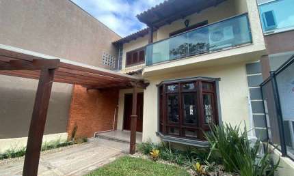 Casa com 3 quartos à venda na Rua Roberto Santini, 194, Hípica, Porto Alegre