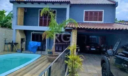 Casa com 4 quartos à venda na Rua Pistoia, 39, Rio Branco, Canoas