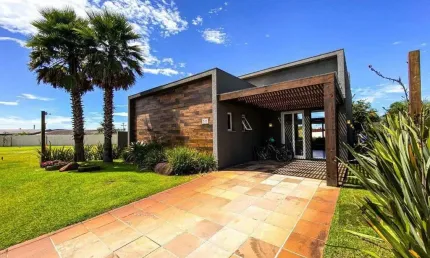 Casa em condomínio 4 dormitórios à venda atlântida sul xangri-lá/rs