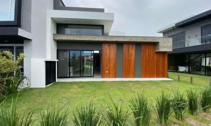 Casa em Condomínio 4 dormitórios à venda Centro Xangri-Lá/RS