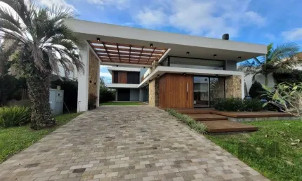 Casa em Condomínio 4 dormitórios à venda Atlântida Xangri-Lá/RS